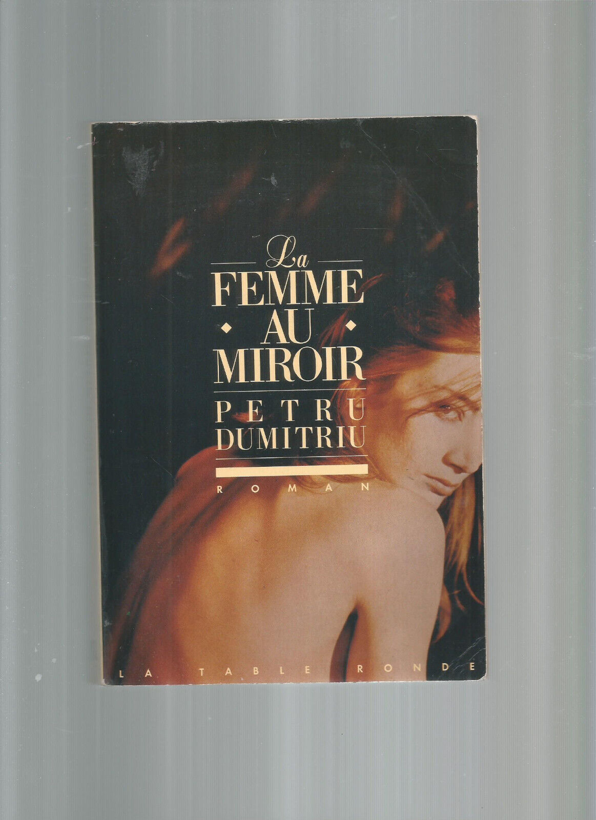 LA FEMME AU MIROIR